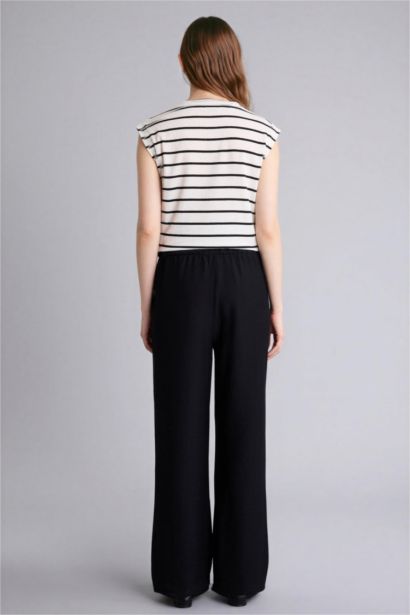 بنطرون قصة مستقيمة برجل عادي