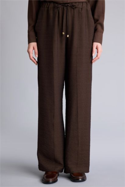 بنطرون قصة مستقيمة برجل عادي