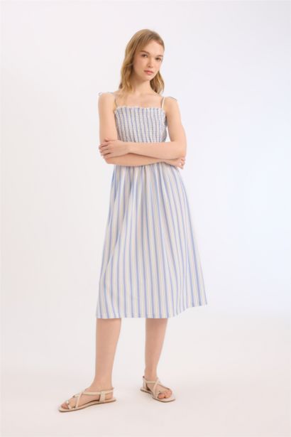 Robe mi-longue rayée à bretelles