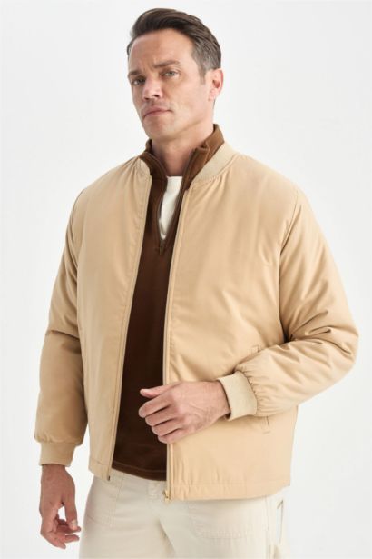 جاكيت بومبر خفيف قصة عادية طارد للماء وياخة كوليج