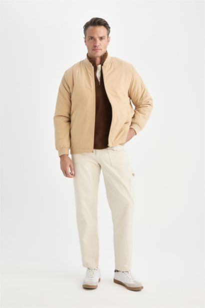 جاكيت بومبر خفيف قصة عادية طارد للماء وياخة كوليج