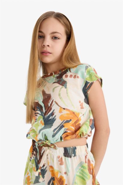 بلوزة كتان بناتي نص كم منقوش أخضر