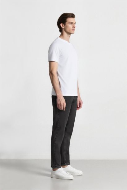 سروال جينز بساق ضيق