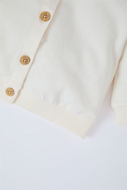 سترة بنات برقبة بالدانتيل قصة عادية