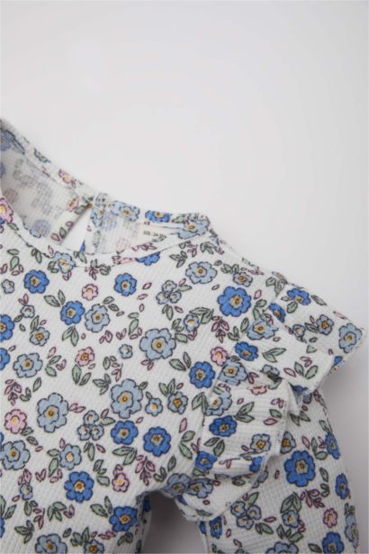 Robe fleurie à manches longues pour bébé fille