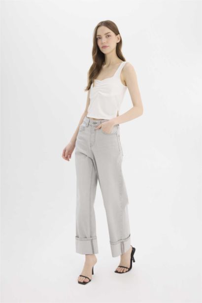 Брюки джинсовые с высокой талией и отворотами, расслабленного кроя