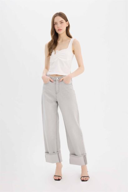 Брюки джинсовые с высокой талией и отворотами, расслабленного кроя