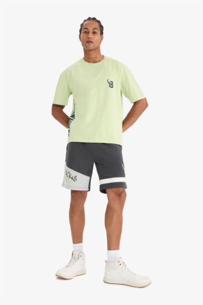 تيشيرت اوفر سايز برقبة مستديرة بطبعة من الخلف من ميلووكي باكس