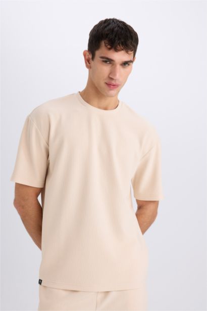 T-shirt boxy à col rond et manches courtes