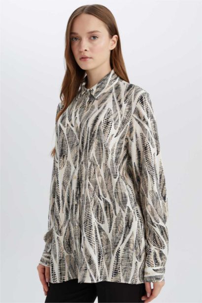 قميص طويل قصة عادية منقوش وردن طويل