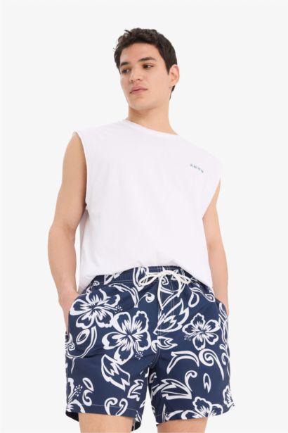 Short de bain court imprimé avec doublure en filet