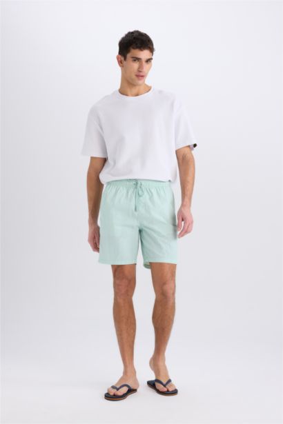 Regular Fit Mesh Lined Above Knee Swim Shorts