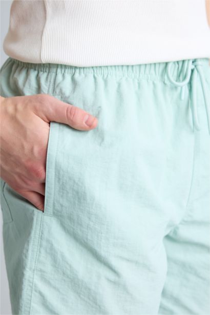 Regular Fit Mesh Lined Above Knee Swim Shorts