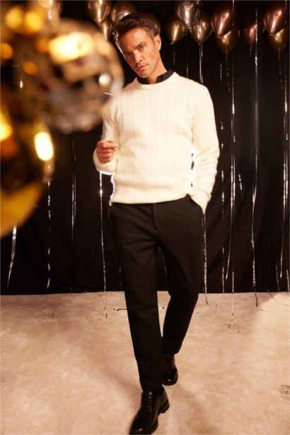 بلوفر تريكو قصة عادية برقبة مستديرة