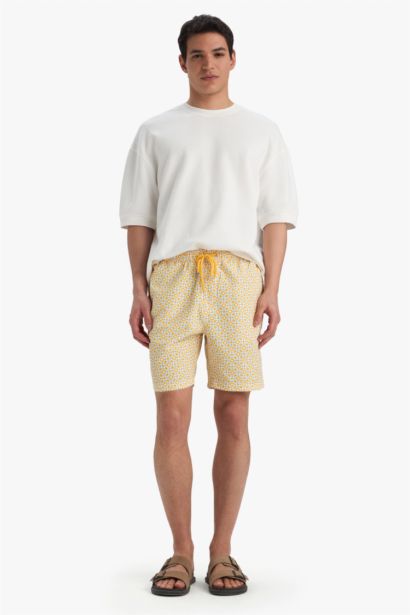 Short de bain mi-long à motifs avec doublure en filet Coupe régulière