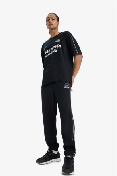 بنطلون جوجر رياضي قماش سكوبا قصة عادية بجيوب و برجل بأستك من DefactoFit