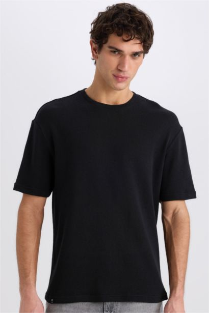 تيشيرت أوفر سايز نص ردن بياخة مستديرة