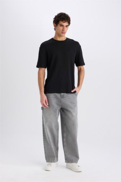 تيشيرت أوفر سايز نص ردن بياخة مستديرة