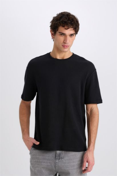 تيشيرت أوفر سايز نص ردن بياخة مستديرة