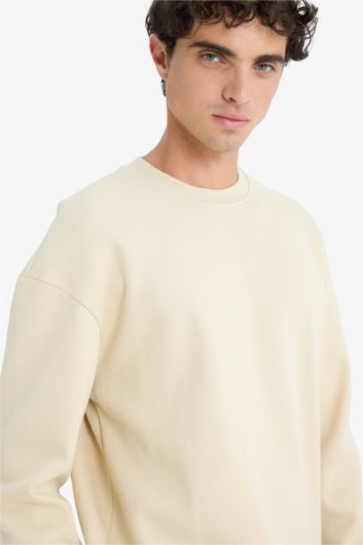 Sweatshirt en piqué à col rond et coupe boxy