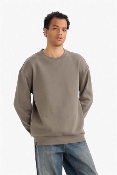 سويت شيرت أوفر سايز بياقة مستديرة