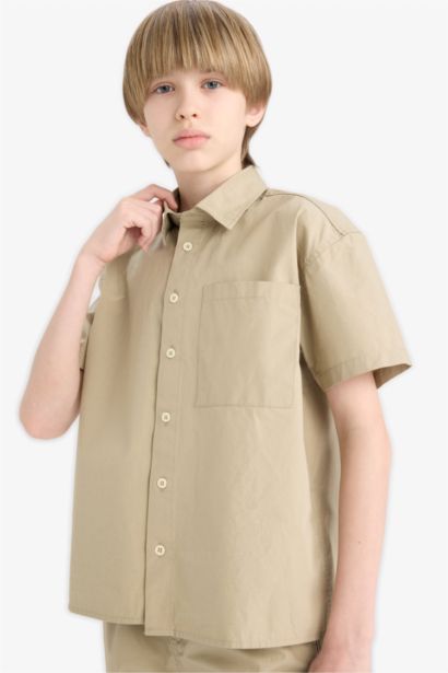 قميص بولو اولادي باراشوت نص كم اوفر سايز