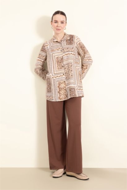 قميص طويل قصة عادية منقوش وردن طويل