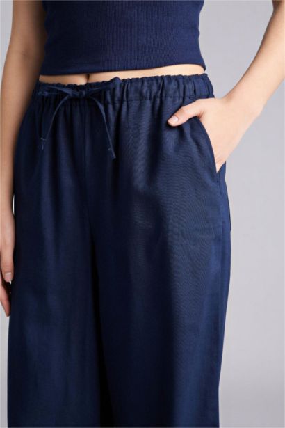 بنطرون وايد ليج برجل واسع بجيب من مزيج الكتان