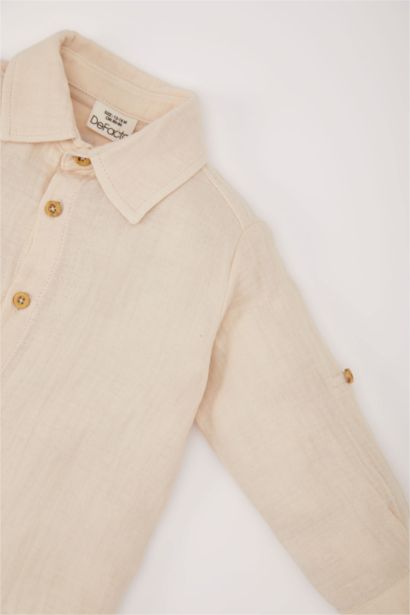 طقم من قميص أولاد برقبة مستديرة و سروال