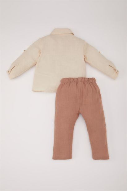 طقم من قميص أولاد برقبة مستديرة و سروال