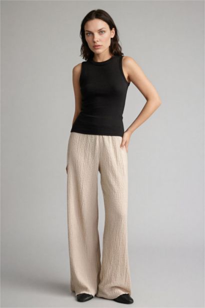 بنطلون وايد ليج برجل واسع