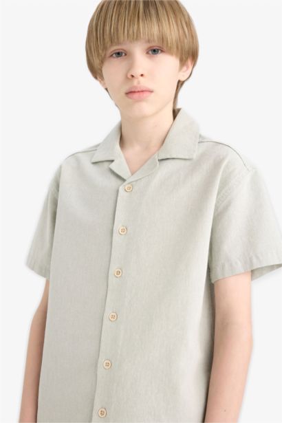 قميص بولو نص كم موسلين اوفر سايز