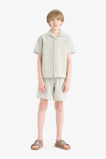 قميص بولو نص كم موسلين اوفر سايز