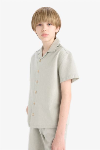 قميص بولو نص كم موسلين اوفر سايز