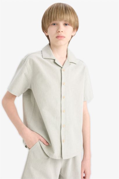 قميص بولو نص كم موسلين اوفر سايز