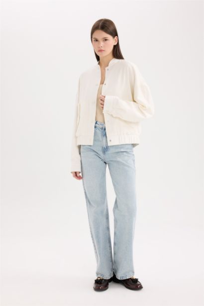 قمصلة نفخ قصة عادية بياقة بولو مبطن بالقطن مقاوم للماء