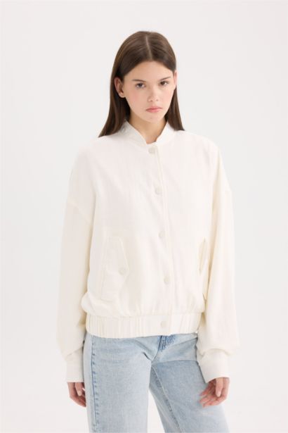 قمصلة نفخ قصة عادية بياقة بولو مبطن بالقطن مقاوم للماء