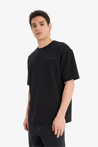 تيشيرت نص ردن قماش رقيق مطبوع أوفر سايز بياقة مستديرة