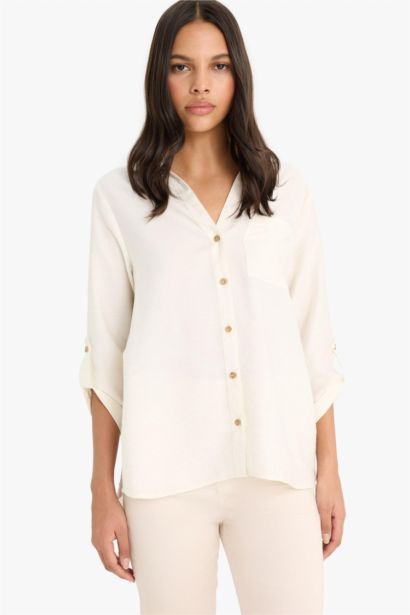 قميص كم طويل قصة عادية