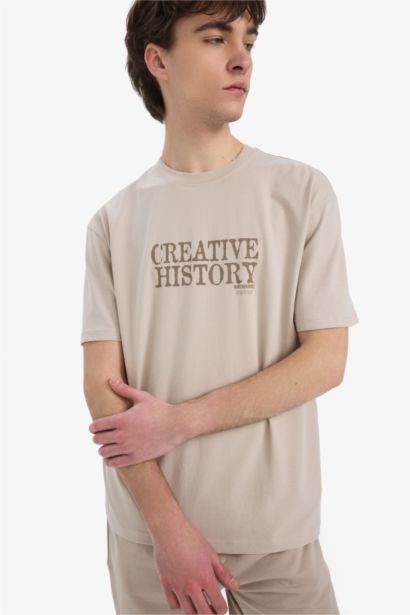 تيشيرت قطن قصة عادية برقبة مستديرة