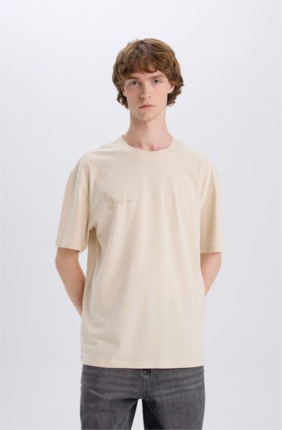 T-shirt boxy en coton imprimé au dos à col rond