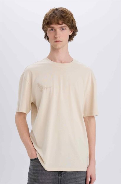 T-shirt boxy en coton imprimé au dos à col rond