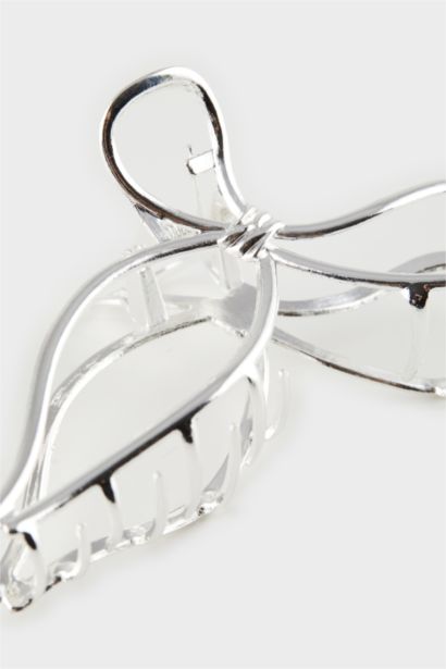 Pince cheveux argentée nœud pour femme