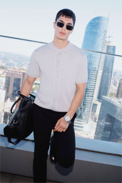 تيشيرت نص كم تريكو ثصة عادية وياقة بولو