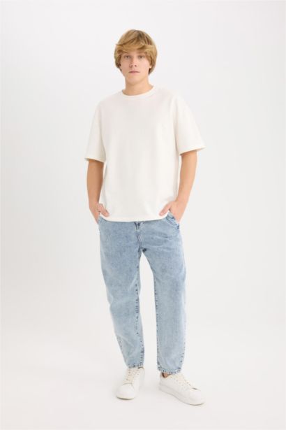 بنطلون جينز قصة فضفاضة برجل واسع