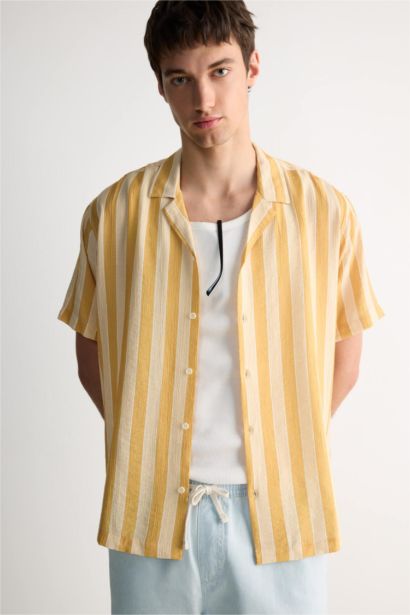 قميص مخطط نص ردن قصة عادية بياخة عالية