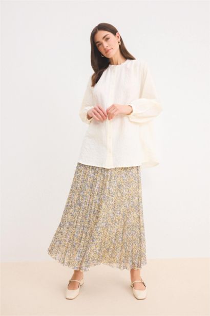 تنورة طويلة شيفون مطبوع بكسرات