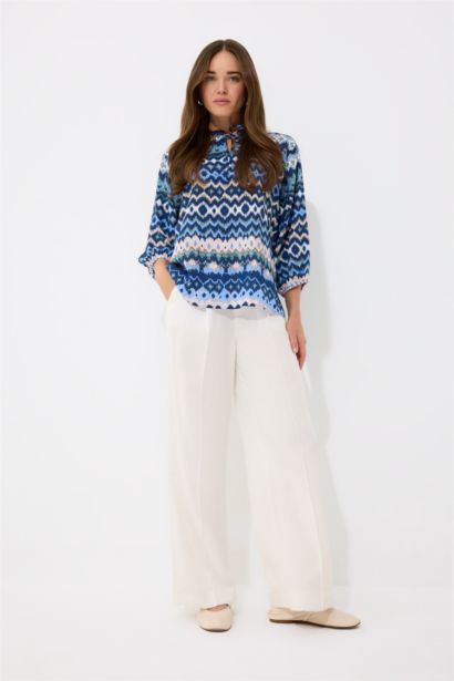 قميص ردن طويل منقوش قصة عادية بياخة V