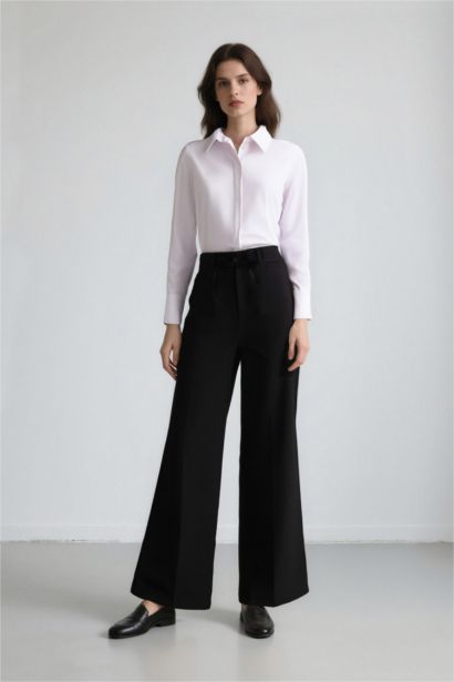 بنطرون قماش وايد ليج برجل واسع بثلاثة جيوب وخصر عادي