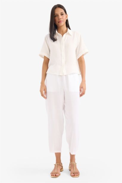 Tapered Fit High Waist Muslin Trousers